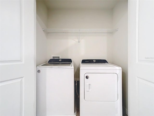 laundry area with washer and dryer