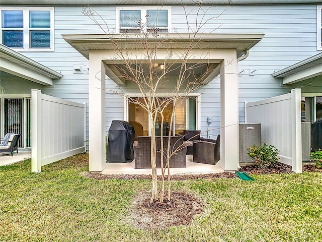 exterior space with an outdoor living space, a patio, and a yard