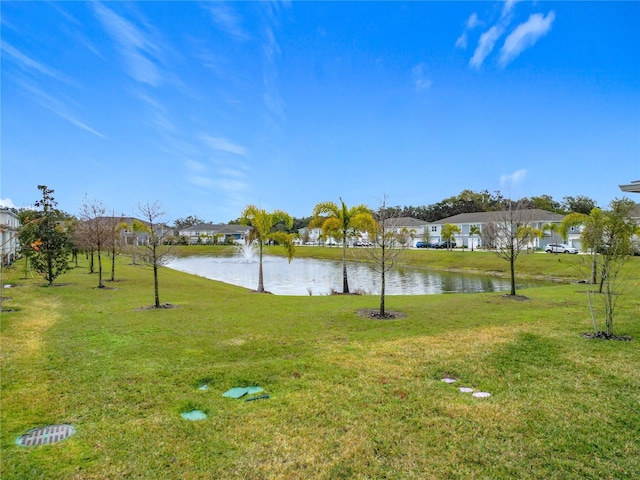 view of yard with a water view