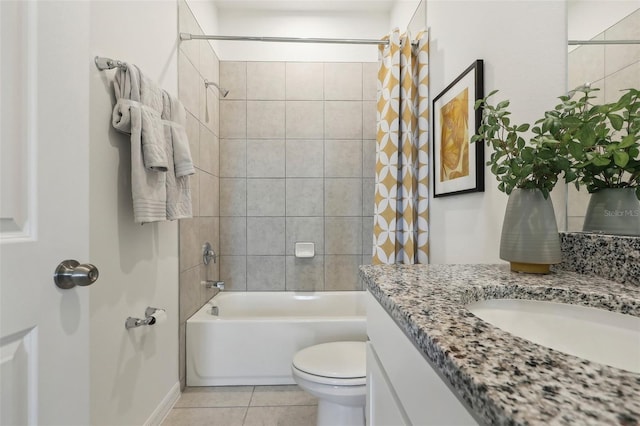 full bathroom featuring vanity, toilet, tile patterned floors, and shower / tub combo