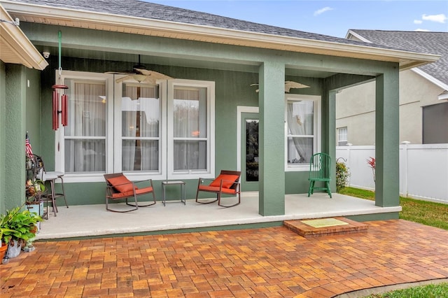 view of patio featuring ceiling fan