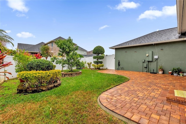 view of yard with a patio area