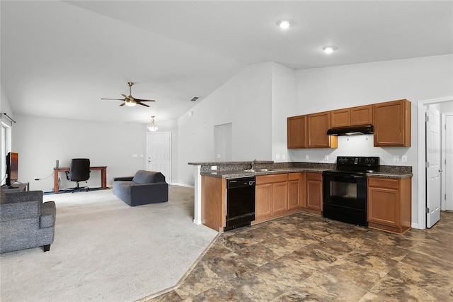 kitchen featuring lofted ceiling, sink, dark colored carpet, kitchen peninsula, and black appliances