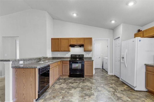 kitchen with vaulted ceiling, black appliances, separate washer and dryer, sink, and kitchen peninsula