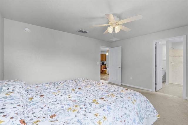 carpeted bedroom featuring connected bathroom and ceiling fan