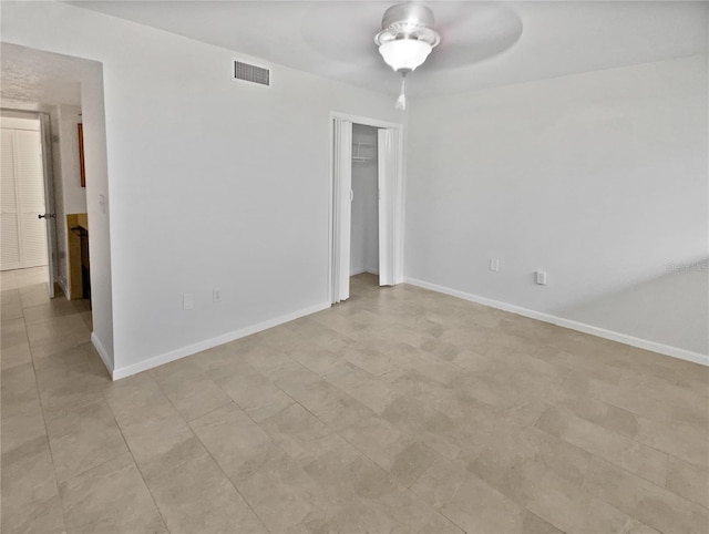 spare room featuring ceiling fan