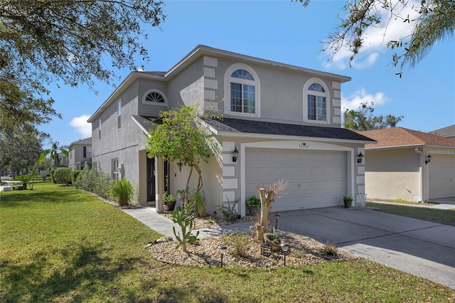 view of front property with a garage and a front lawn