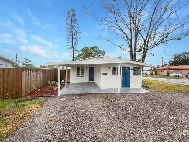 view of front of house with a carport