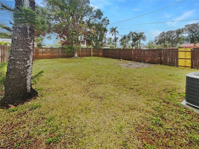 view of yard with central AC