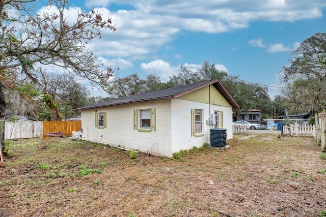 view of side of property featuring cooling unit