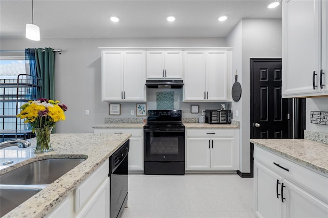 kitchen with hanging light fixtures, sink, white cabinets, and black appliances