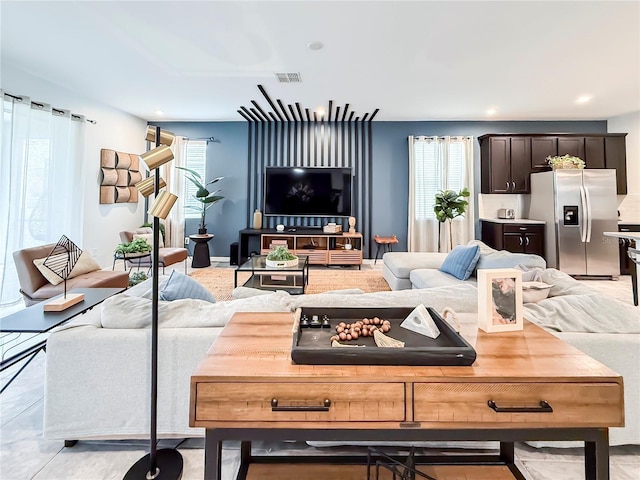 living room with plenty of natural light