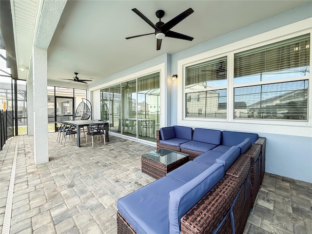 view of patio / terrace with ceiling fan and an outdoor hangout area