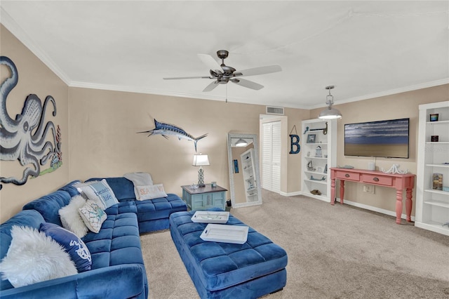 carpeted living room with ceiling fan and ornamental molding