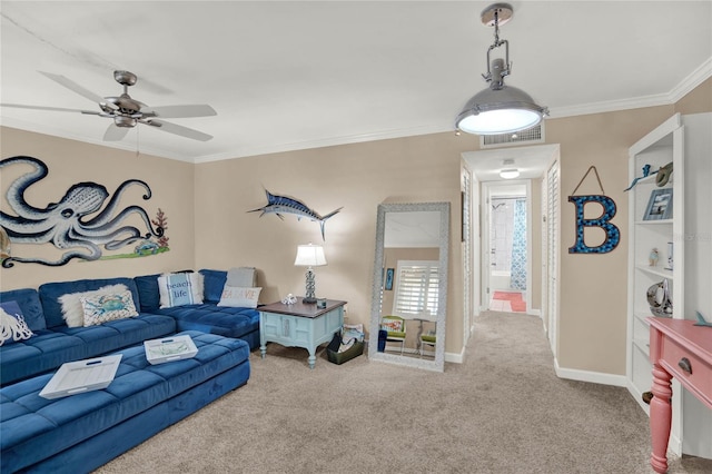 living room with crown molding, carpet floors, and ceiling fan