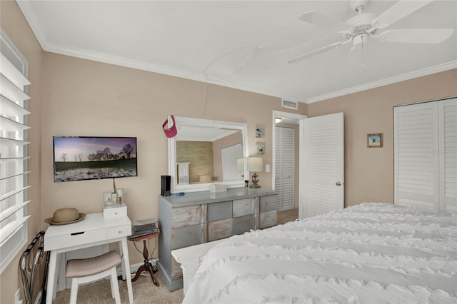 bedroom featuring ceiling fan, carpet, and crown molding