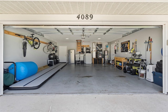 garage with stainless steel refrigerator