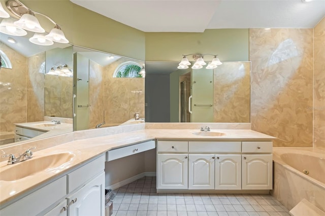 bathroom featuring tile patterned flooring, a tub to relax in, and vanity