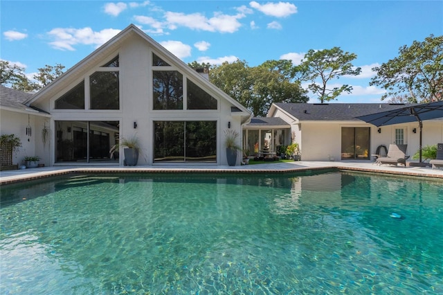 view of pool featuring a patio area