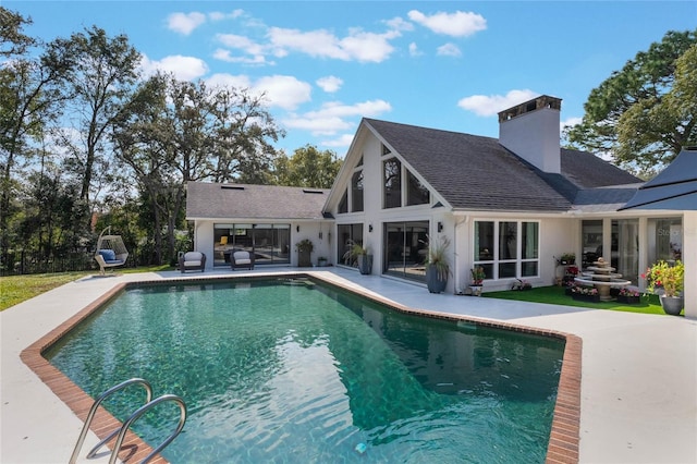 view of swimming pool featuring a patio