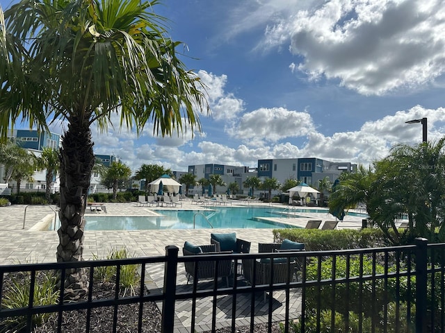 view of swimming pool featuring a patio