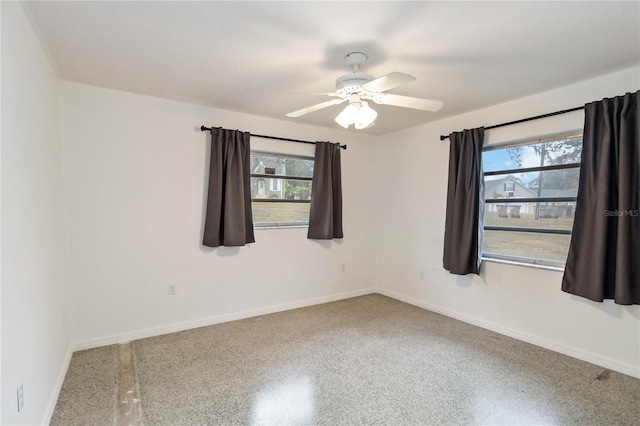 unfurnished room featuring ceiling fan