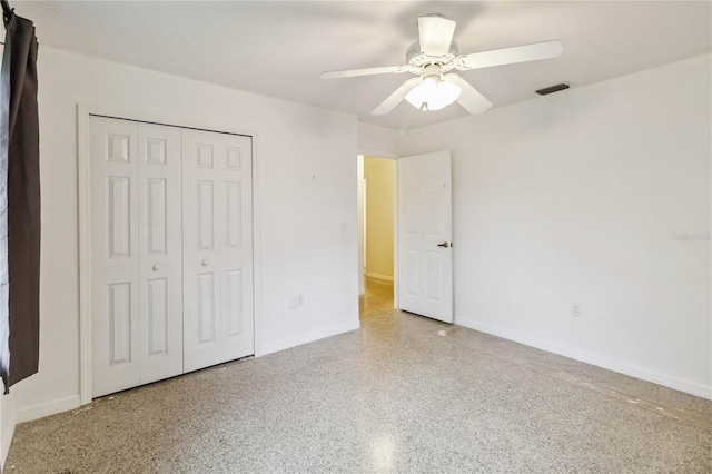 unfurnished bedroom with a closet and ceiling fan