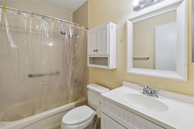 full bathroom with vanity, shower / tub combo with curtain, and toilet