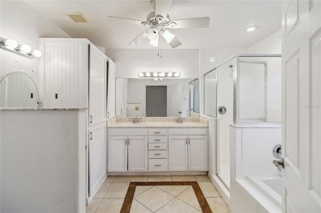 bathroom featuring ceiling fan, vanity, independent shower and bath, and tile patterned flooring