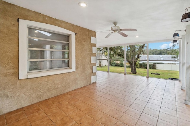 view of patio featuring ceiling fan