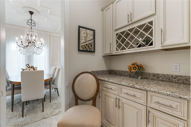 dining room with crown molding and an inviting chandelier