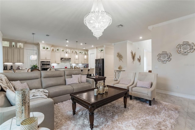 living room featuring ornamental molding, light tile patterned floors, and a chandelier