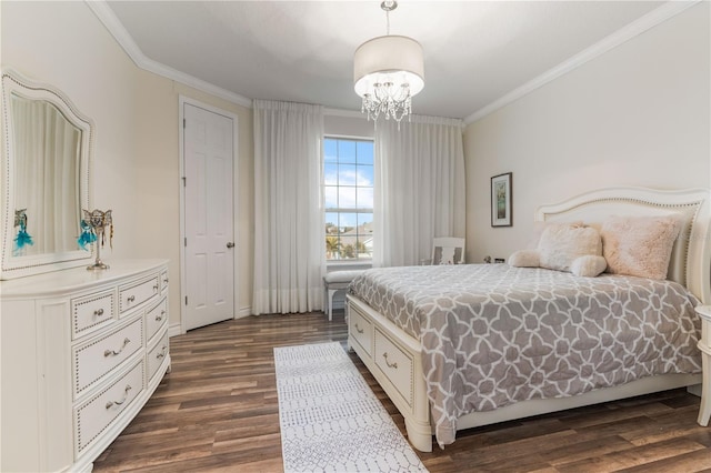 bedroom featuring an inviting chandelier, ornamental molding, and dark hardwood / wood-style flooring