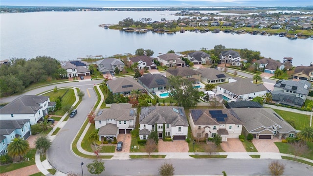 drone / aerial view with a water view