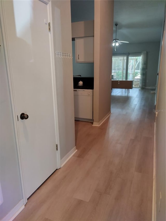 hallway featuring light wood-type flooring