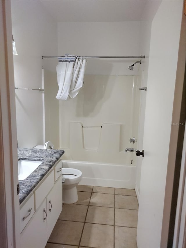 full bathroom featuring vanity, toilet, shower / washtub combination, and tile patterned flooring