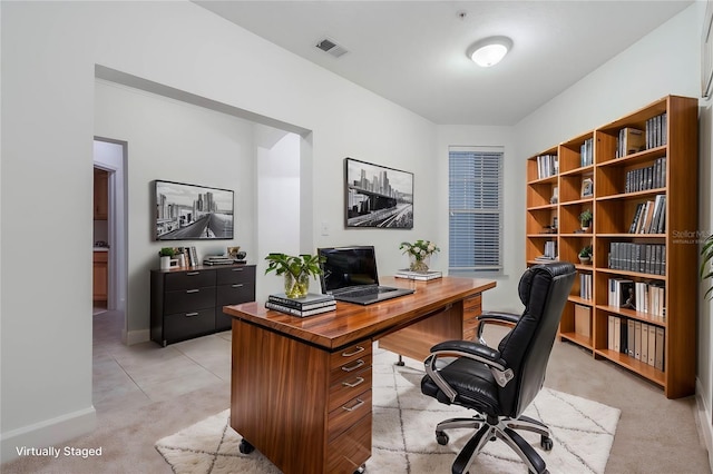 view of carpeted home office