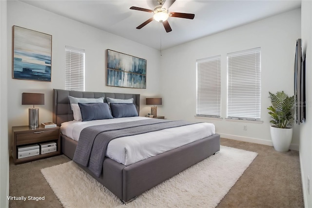 bedroom featuring carpet and ceiling fan