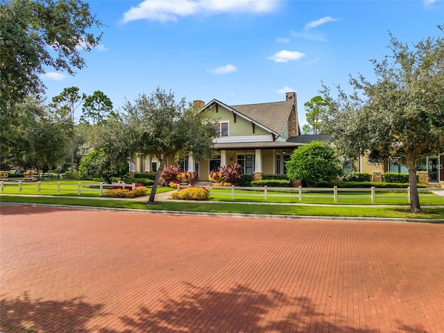 view of front of home with a front lawn