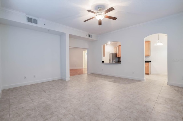 unfurnished living room featuring crown molding and ceiling fan