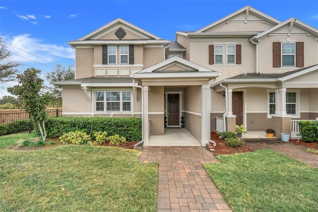 view of front of home featuring a front yard