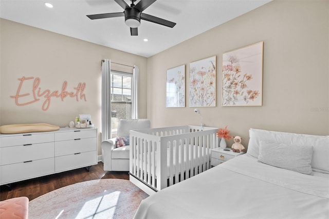 bedroom featuring dark wood-type flooring and ceiling fan