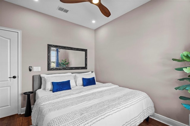 bedroom featuring ceiling fan and dark wood-type flooring