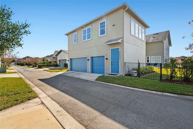 exterior space with a garage and a front lawn