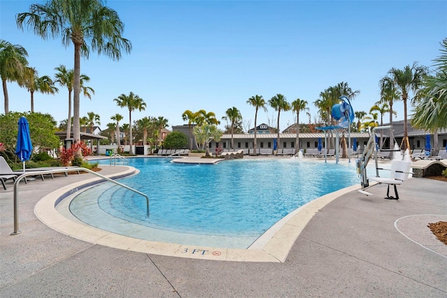 view of swimming pool featuring a patio