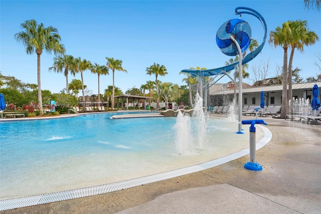 view of swimming pool featuring pool water feature