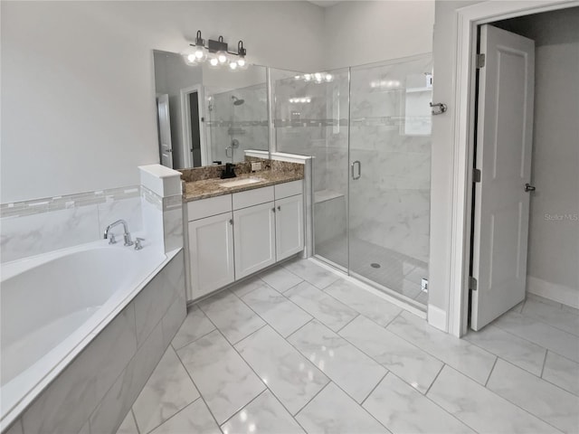 bathroom featuring vanity and separate shower and tub