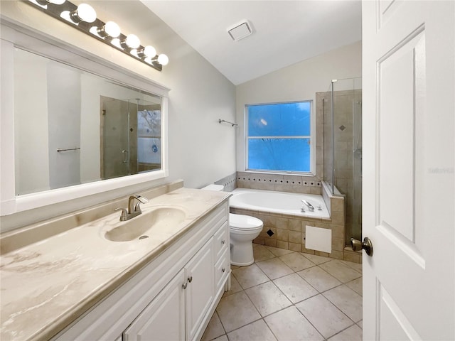 full bathroom with vaulted ceiling, independent shower and bath, vanity, toilet, and tile patterned floors