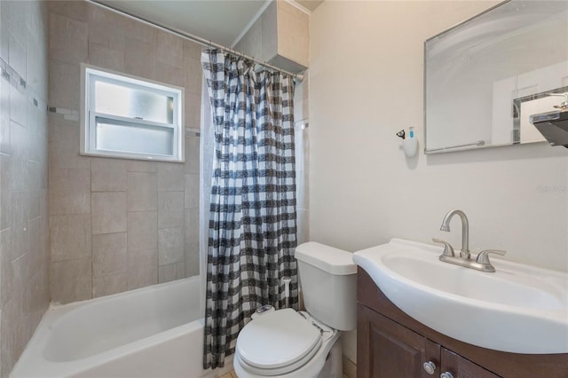 full bathroom with vanity, toilet, and shower / tub combo