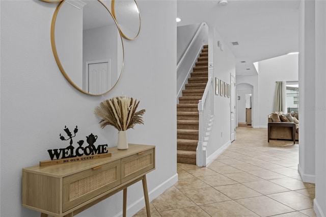 entryway featuring light tile patterned floors